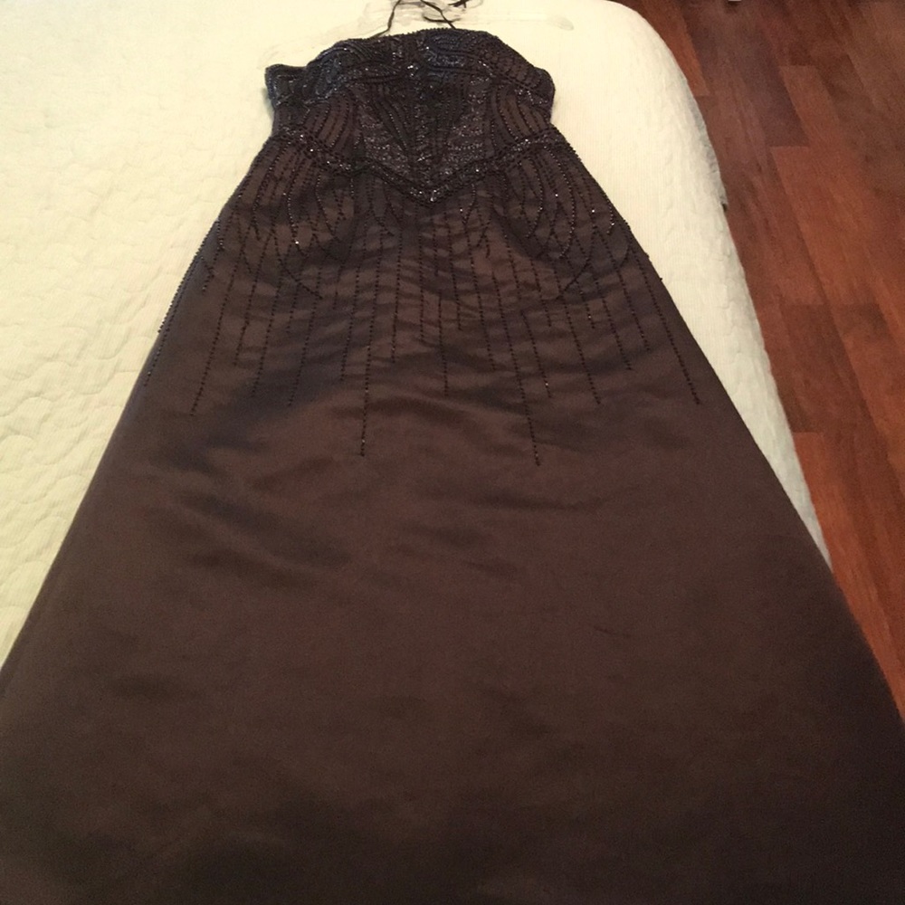 full length beaded black evening gown.